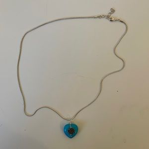 Silver necklace with turquoise heart pendant and Celtic eternity knot
